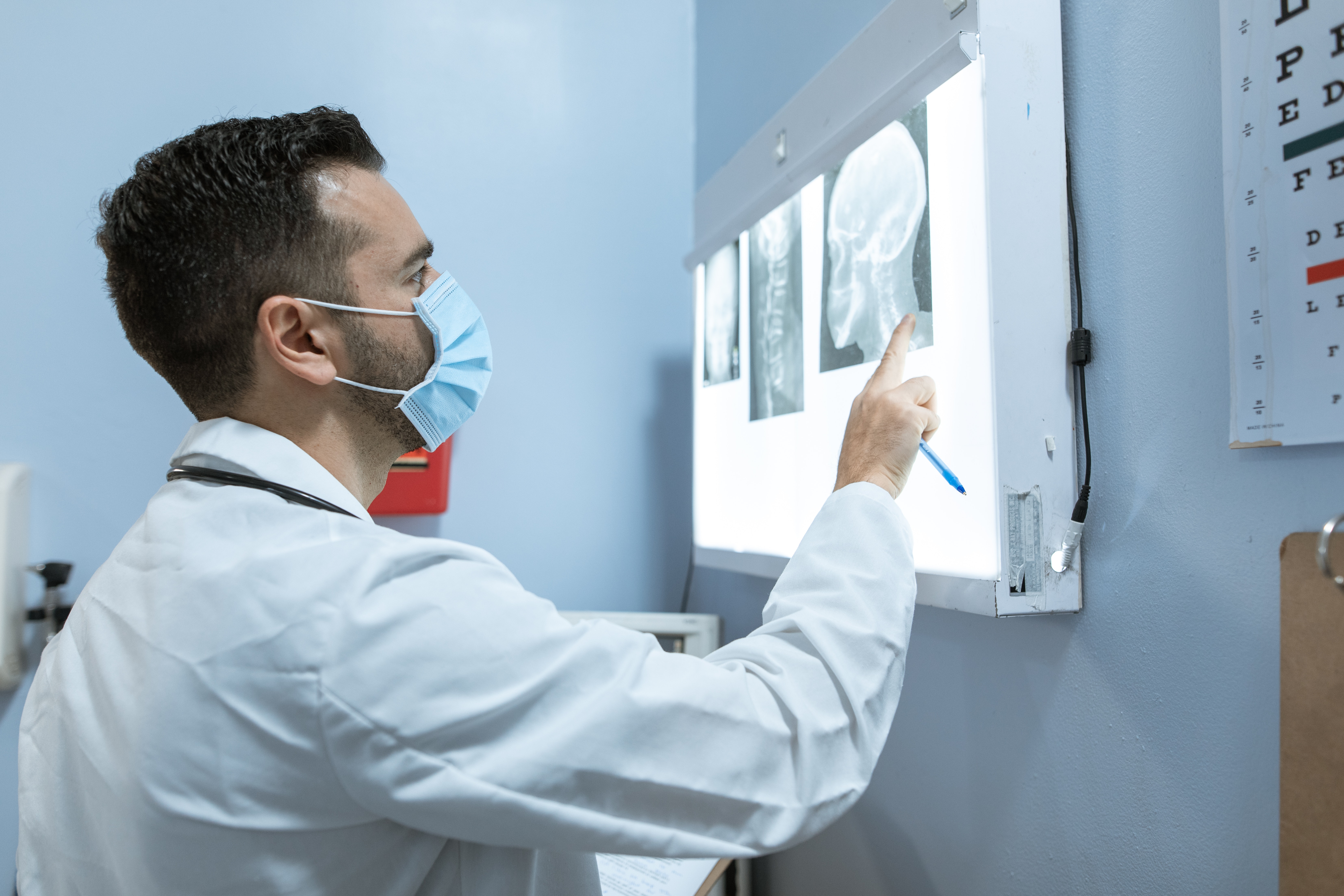 Doctor examining x-rays